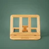 Mini wooden book and laptop stand front view